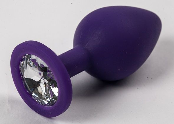 Фиолетовая силиконовая пробка с прозрачным кристаллом - 9,5 см. купить в секс шопе