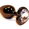 Чёрная пробка с прозрачным сердцем-кристаллом - 7 см. купить в секс шопе