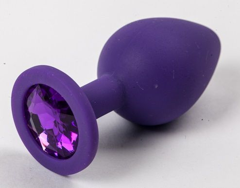 Большая фиолетовая силиконовая пробка с фиолетовым кристаллом - 9,5 см. купить в секс шопе