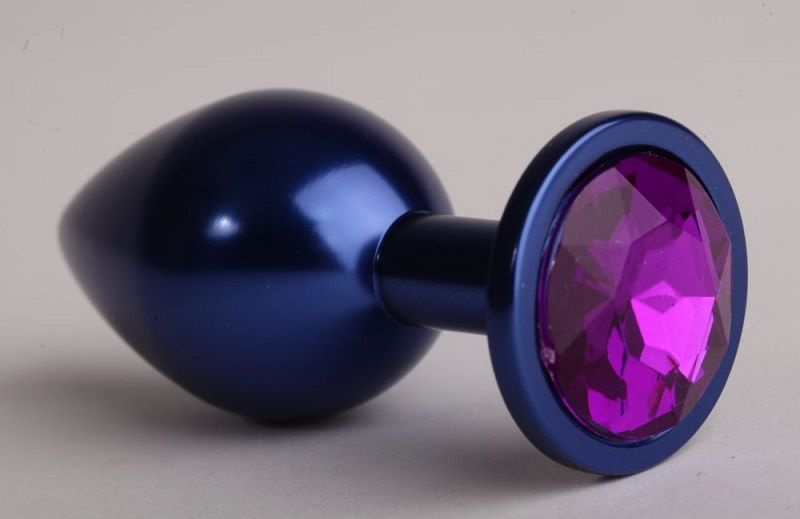 Синяя анальная пробка с фиолетовым стразом - 7,6 см. купить в секс шопе