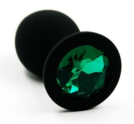Чёрная силиконовая анальная пробка с изумрудным кристаллом - 7 см. купить в секс шопе