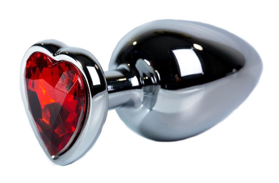 Серебристая анальная пробка с красным кристаллом-сердцем размера L - 9,5 см. купить в секс шопе