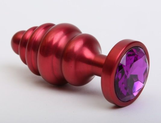 Красная ребристая анальная пробка с фиолетовым стразом - 7,3 см. купить в секс шопе