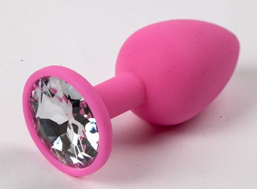 Розовая силиконовая анальная пробка с прозрачным стразом - 7,1 см. купить в секс шопе