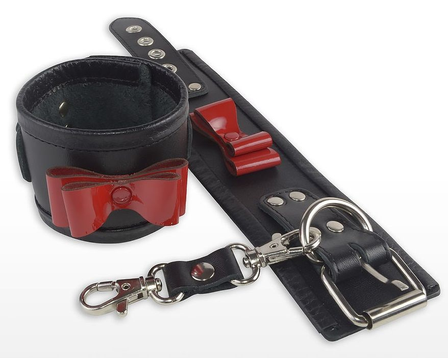 Черные наручники с красными лаковыми бантами купить в секс шопе