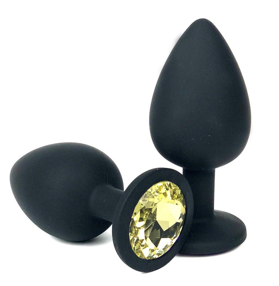 Черная силиконовая анальная пробка с желтым стразом - 8 см. купить в секс шопе