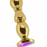 Золотистая фигурная анальная пробка с фиолетовым кристаллом - 14 см. купить в секс шопе