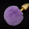Маленькая золотистая пробка с пушистым фиолетовым хвостиком купить в секс шопе