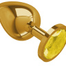 Золотистая большая анальная пробка с желтым кристаллом - 9,5 см. купить в секс шопе