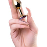Золотистая анальная втулка с фиолетовым стразом - 7 см. купить в секс шопе
