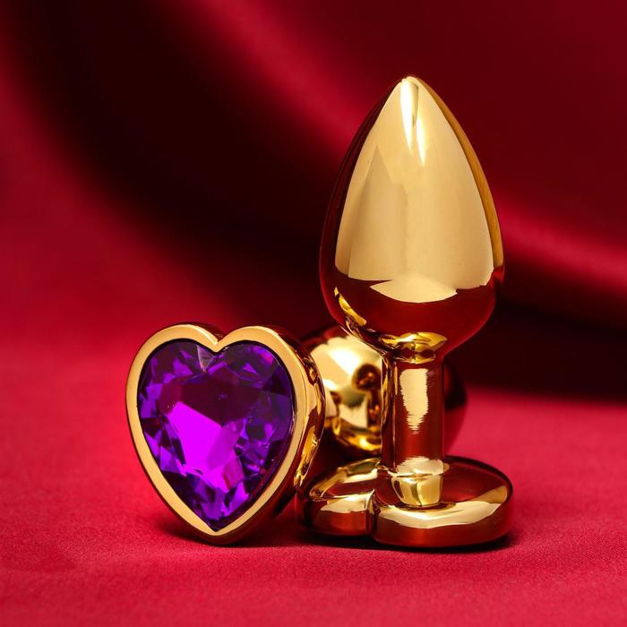 Золотистая анальная пробка с фиолетовым кристаллом в форме сердца купить в секс шопе