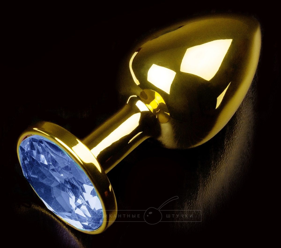 Золотистая анальная втулка с синим стразом - 7 см. купить в секс шопе