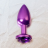Фиолетовый анальный плаг с кристаллом фиолетового цвета - 7,2 см. купить в секс шопе