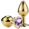Золотистая анальная пробка с сиреневым кристаллом-сердечком - 6,8 см. купить в секс шопе
