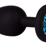 Чёрная анальная втулка с голубым кристаллом - 7,3 см. купить в секс шопе