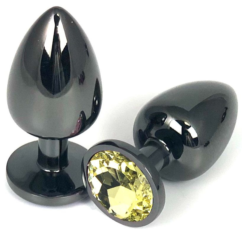 Черная металлическая анальная пробка с желтым стразом - 6,5 см. купить в секс шопе